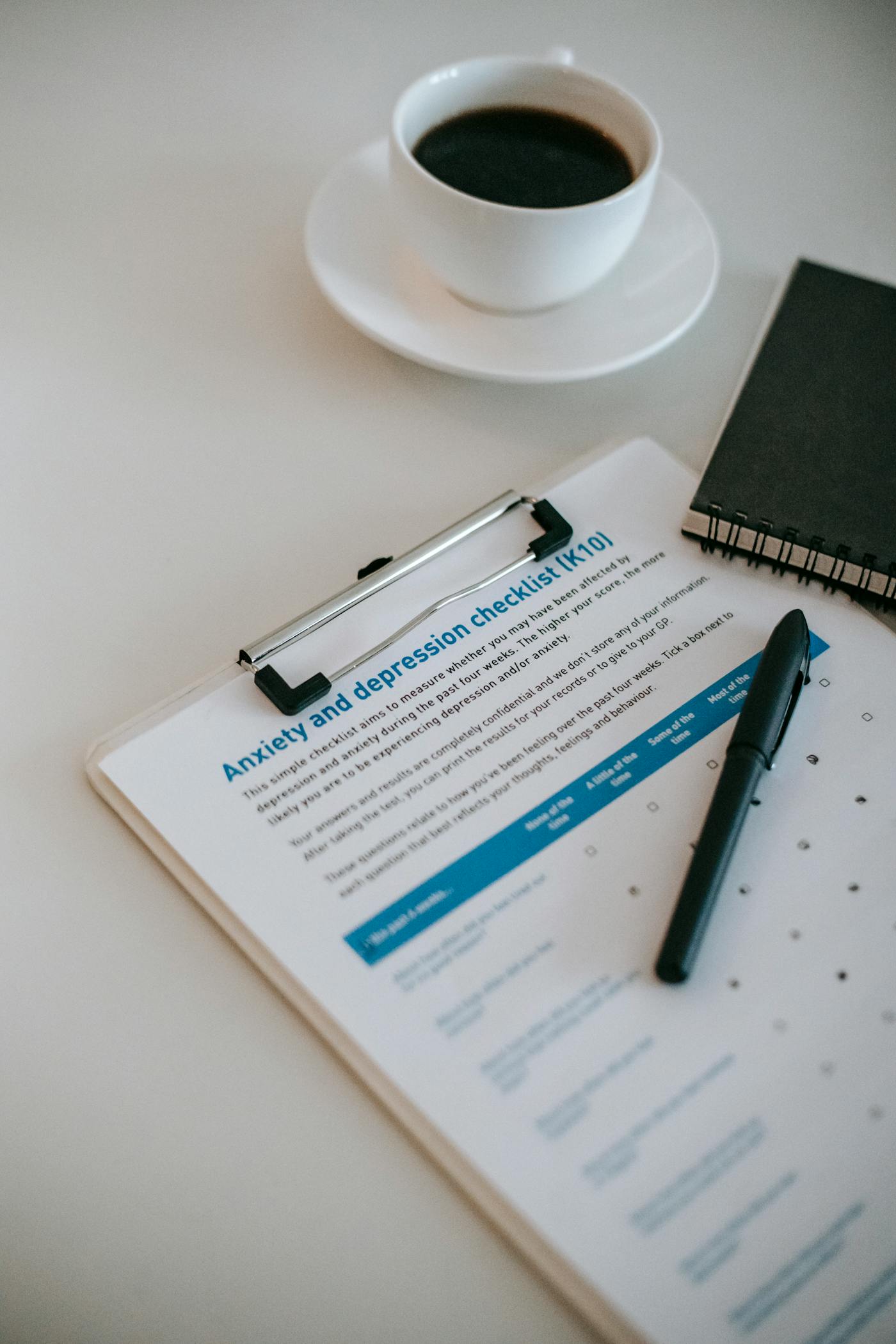 Pharmacist assisting patient at counter